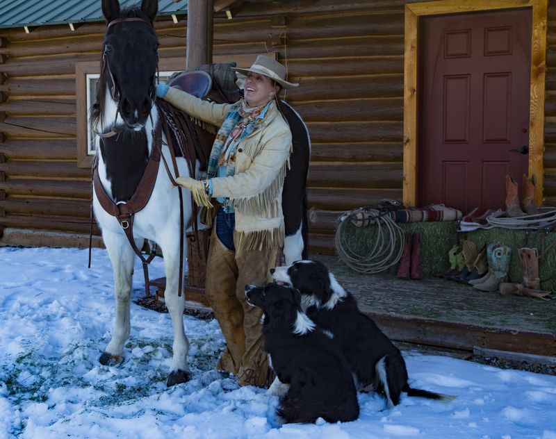 Maryn Werquih with her horse and dogs 